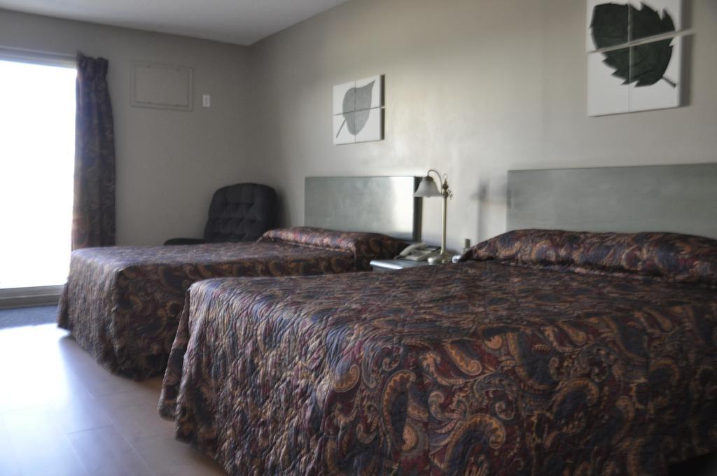 Motel Les Pignons Verts Buckingham Quarto foto