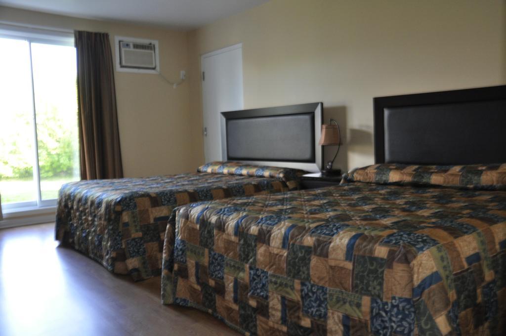 Motel Les Pignons Verts Buckingham Quarto foto